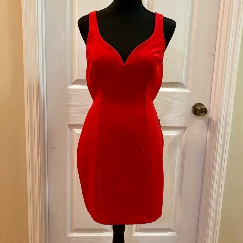 NWT!  B.Darlin Open back rib cage, semiformal mini dress, super sexy, sz 9/10